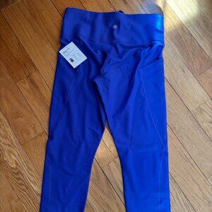 NWT Athleta Interval Stash 7/8 Tight Legging M/P
